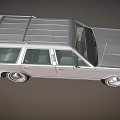 Vintage White Station Wagon With Roof Rack And Classic Silver Body Design