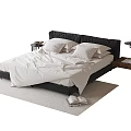 Double Bed With Black Headboard White Sheets Pillows Nightstand And Books On Rug