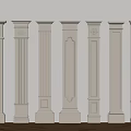 White Decorative Columns With Various Designs Arranged On Wooden Floor