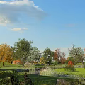 Beautiful Natural Scenery With Blue Sky White Clouds Colorful Trees Green Grass and Small Pond