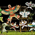 Traditional Kites On Bamboo Frame With Lanterns And Person In Costume Photo Check in Spot