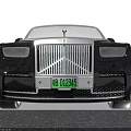 Luxury Rolls Royce Sedan Black Silver with Chrome Front Grille Iconic Emblem Green License Plate