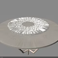 Round White Dining Table With Textured Top And Geometric Base Design