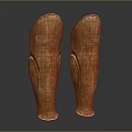Two Shiny Golden Metallic Leg Armor With Curved Design And Glossy Finish