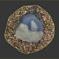 Wood And Stone Decorative Circle Featuring Blue Stone Center Brown Wood Chips And Green Plants
