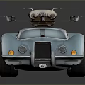 Blue Vintage Sports Car Featuring Streamlined Design And Roof Equipment With Metallic Finish