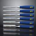 Set of Woodworking Chisels With Blue Handles And Yellow MTLS Labels