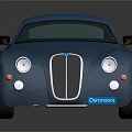 Vintage Blue Sports Car With Streamlined Body Round Headlights And Black Wheels