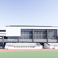 Modern School Building With White Exterior Large Glass Windows And Sports Field Area