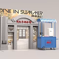 Summer Dine Experience Venue with Blue Food Truck and Arch Entrance Design