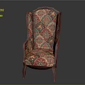 Traditional Vintage Armchair With Intricate Red Green Gold Patterns And Wooden Legs