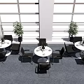 Modern Indoor Tables And Chairs With White Surfaces Black Seats Large Windows And Potted Plants