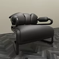 Modern Black Single Sofa Featuring Unique Armrest Design Against Light Wall On Herringbone Floor 3d model