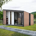 Modern Detached Villa Exterior With Large Glass Windows Wooden Panels And Green Lawn