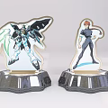 Anime Character Acrylic Stands With Mechanical And Male Figure Designs On Shiny Black Bases