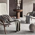 Neutral Tones Lounge Chairs With Throw Blankets Arched Doorway Potted Plant And Round Side Table