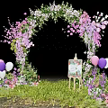 Floral Event Entrance Arch With Pink Purple Flowers Balloons Easel Sign And Green Grass