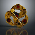 Golden Decorative Lifestyle Accessory With Red Gemstones And Intricate Pattern