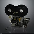 Vintage Film Projector With Large Black Reels And Metal Components On Dark Background