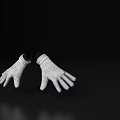 Elegant White Knit Gloves Display Intricate Texture On Black Background
