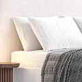 Minimalist Double Bed With White Pillows Mattress And Cozy Plaid Blanket