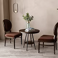Interior Table And Chair Set With Brown Upholstered Chairs Round Small Table Green Plant And Books