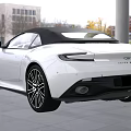 White Aston Martin Convertible Sports Car With Black Grille And Headlights Design