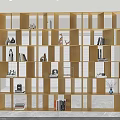 Modern Open Grid Bookshelf With Books Decorative Sculptures And Vases In Bright Room