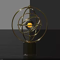 Modern Gold Metal Decorative Ornament Set With Circular Frame And Glowing Sphere On Marble Base