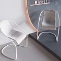 Curved Design Woven Single Chair With Light Gray Cushion And White Frame In Modern Interior