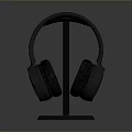 Black Over Ear Computer Headphones On Metal Stand With Dark Background And Reflection Effect 3d model