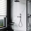 Stylish Black Shower Head in Modern Bathroom with White Marble Tiles and Black Side Table