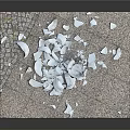 Gray Textured Ground Surface With Scattered White Broken Glass And Ceramic Pieces