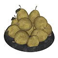 Fresh Yellow Pears in Black Bowl with Green Leaves on White Background