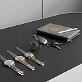 Elegant Watches Of Different Styles On Black Table With Notebook Pen And Keys