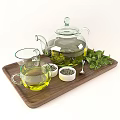 Fresh Green Tea In Glass Teapot With Mint Leaves On Wooden Tray