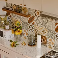 Modern Kitchen Interior With White Cabinets Black Refrigerator Patterned Tile Backsplash And Wooden Floor