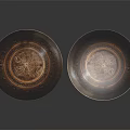 Two Decorative Metal Bowls With Intricate Patterns For Home Decoration