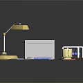 Modern Office Desk Setup With Gold Desk Lamp Silver Laptop Calculator And Blue Pen
