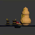 Stylish Gold Teapot With Teacups And Plate Featuring Red And Blue Items On Blue Tray