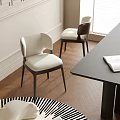 Modern Dining Chairs With White Curved Seats And Black Legs By Dark Dining Table