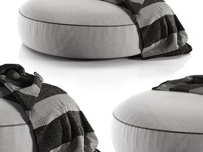 Modern Round Light Gray Ottoman With Black And White Striped Blanket Draped On Top 3d model