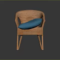Wicker Outdoor Chair With Blue Cushion And Curved Armrests For Stylish Seating