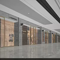Modern Shopping Mall Storefronts With Glass Doors Bright Lighting And Spacious Marble Flooring