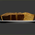 Golden Sliced Round Cake Served On White Plate With Dark Background