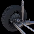 Car Axle Suspension System With Silver Metal Parts And Black Wheels