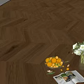 Rich Brown Herringbone Wooden Flooring With Fruit Bowl And Flower Arrangement