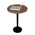 Round Wooden Dining Table With White Notebook White Cup And Black Base 3d model