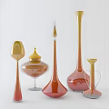 Elegant Glass Vases And Bottles With Gold Orange Pink Tones And Unique Shapes
