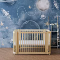 Wooden Baby Crib In Nursery With Space Themed Wallpaper Planets Rocket And String Lights